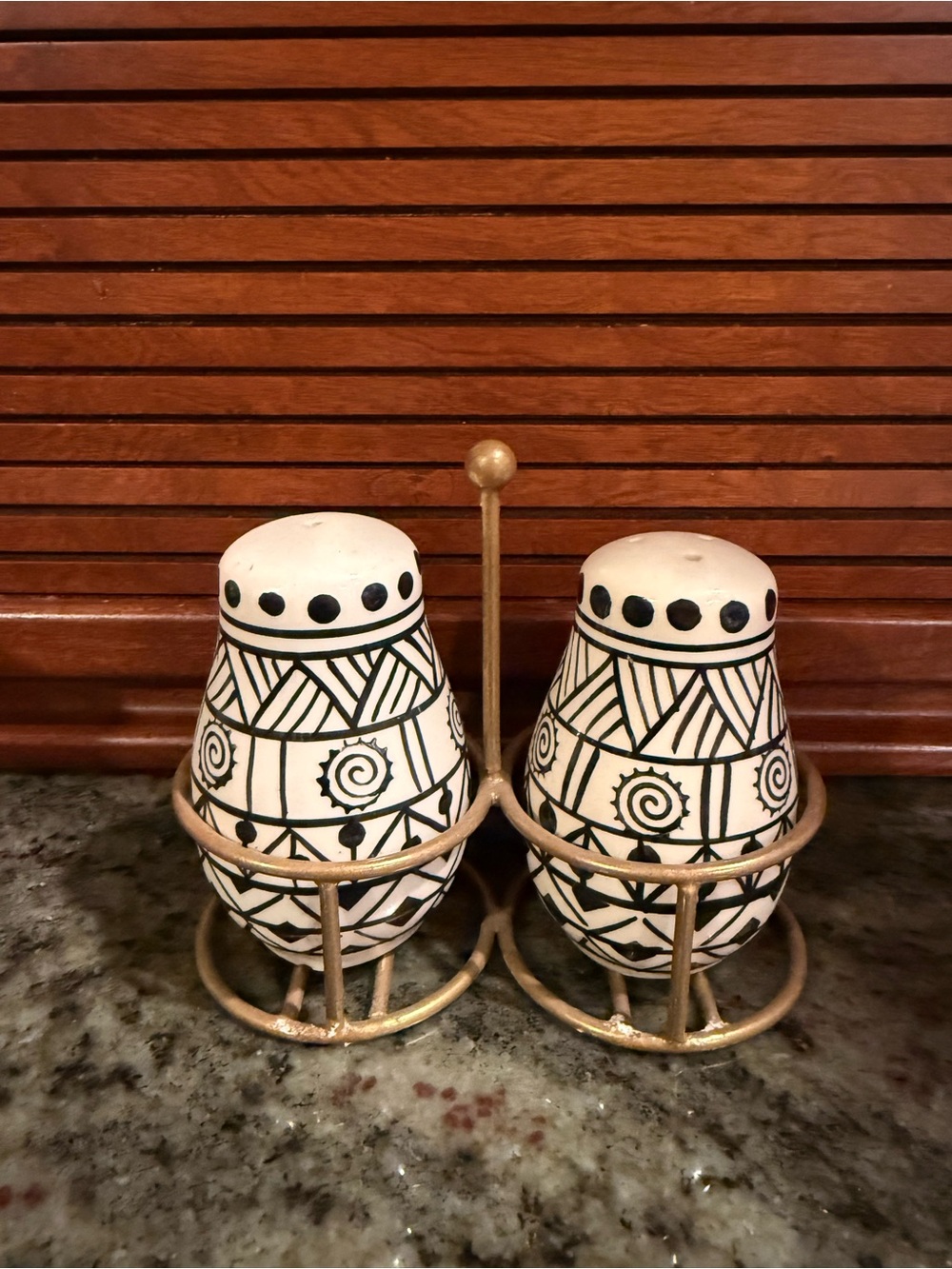 Geometric hand painted pottery salt & pepper shakers with gold stand